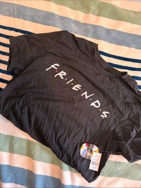FRIENDS Black Tee with Multicolor Logo Tag